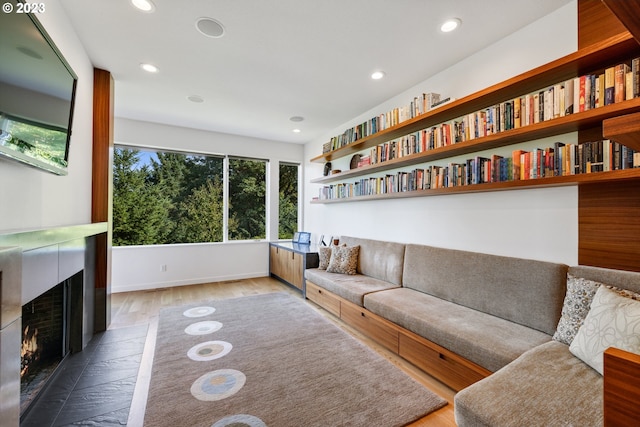 unfurnished living room featuring light hardwood / wood-style flooring