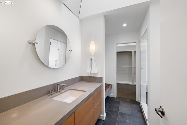 bathroom featuring tile patterned floors and vanity