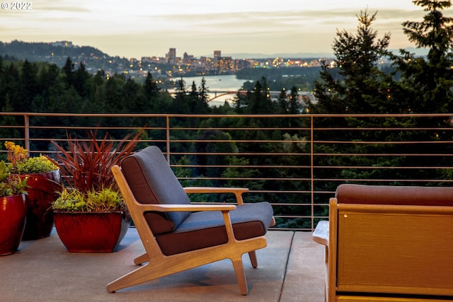 view of balcony at dusk