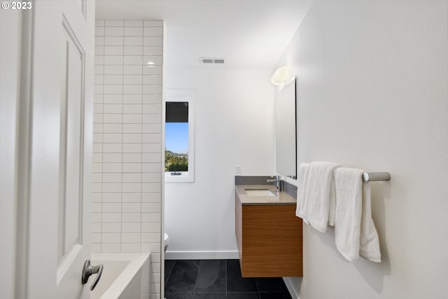 full bathroom with tile patterned flooring, toilet, vanity, and tub / shower combination