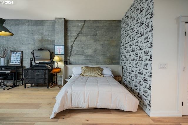 bedroom featuring wood-type flooring