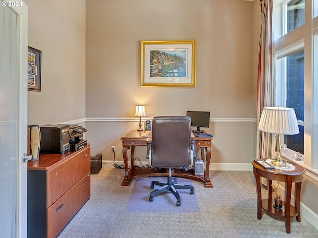 office featuring baseboards and carpet