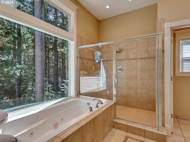 full bathroom with a jetted tub, a stall shower, tile patterned floors, and recessed lighting