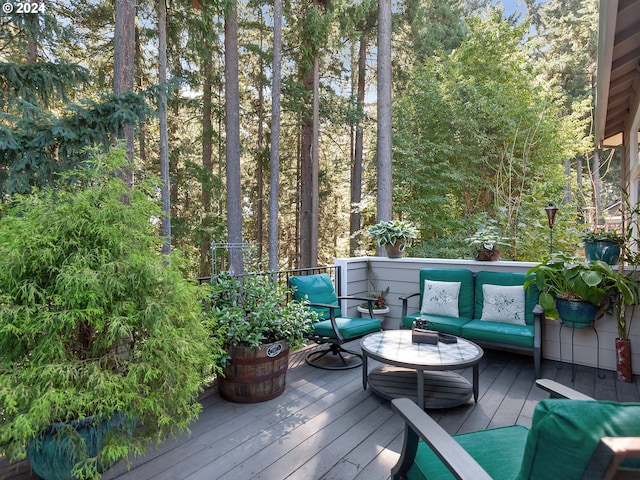 wooden deck featuring outdoor lounge area
