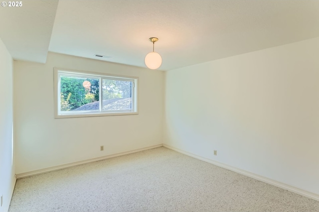 14940 SW 103rd Ave, Portland, OR 97224 - spare room with visible vents and baseboards
