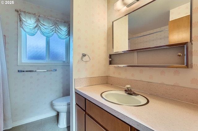 14940 SW 103rd Ave, Portland, OR 97224 - bathroom featuring vanity, wallpapered walls, and toilet