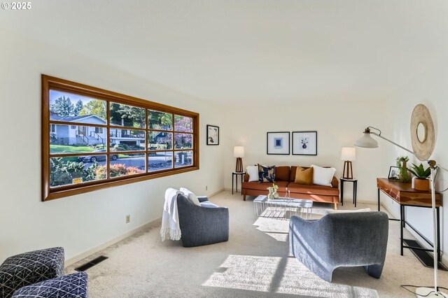 14940 SW 103rd Ave, Portland, OR 97224 - carpeted living area with visible vents and baseboards