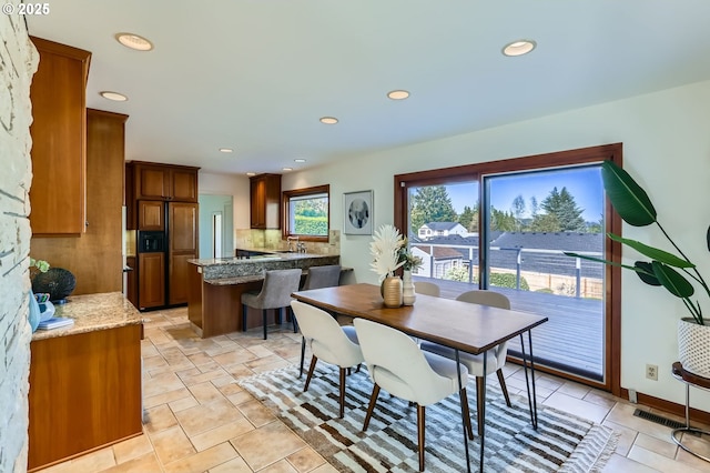 14940 SW 103rd Ave, Portland, OR 97224 - dining space featuring recessed lighting and visible vents