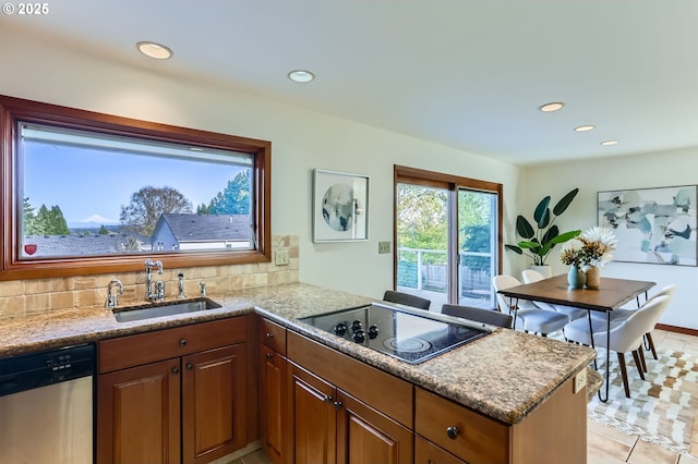 14940 SW 103rd Ave, Portland, OR 97224 - kitchen featuring recessed lighting, a peninsula, black electric cooktop, stainless steel dishwasher, and a sink