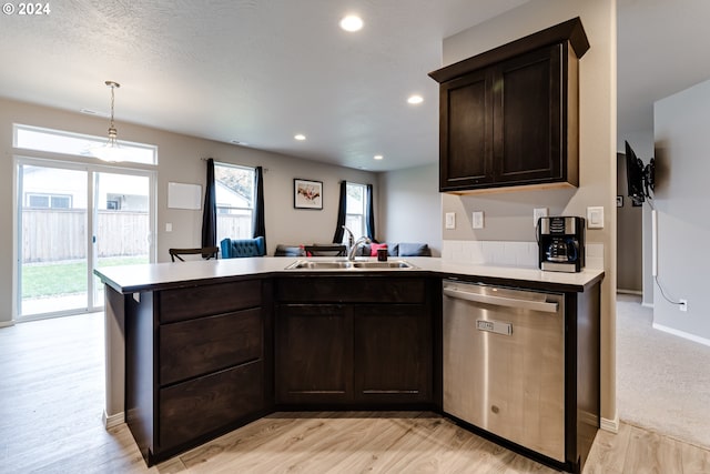 kitchen with dishwasher, light wood-type flooring, sink, and dark brown cabinetry