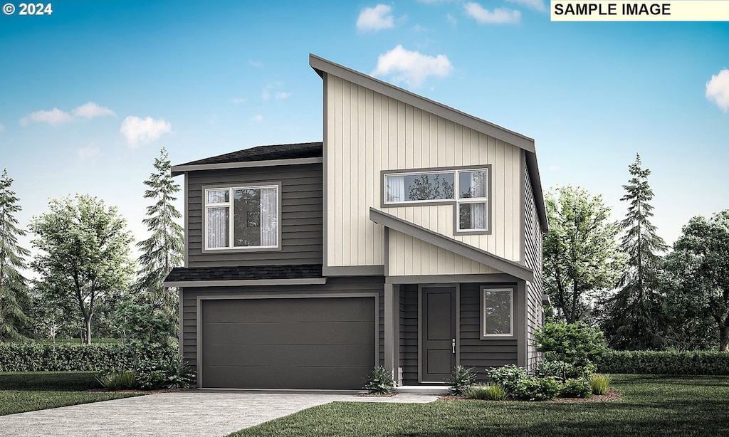 view of front facade featuring a front yard and a garage