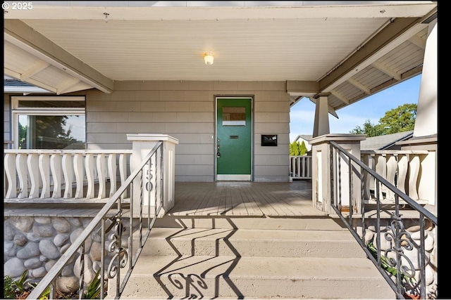 doorway to property with a porch