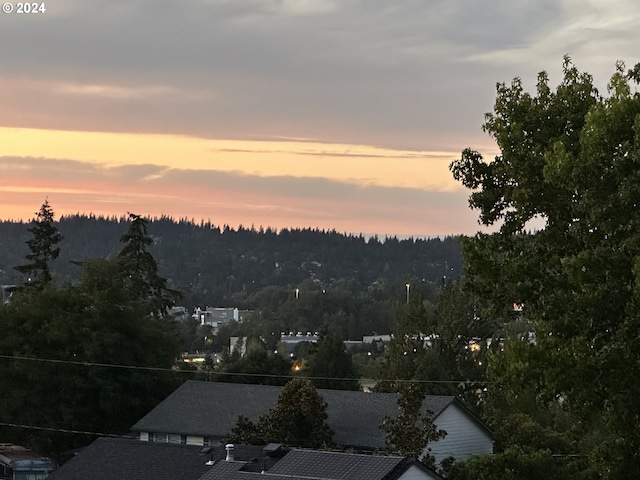 mountain view featuring a view of trees