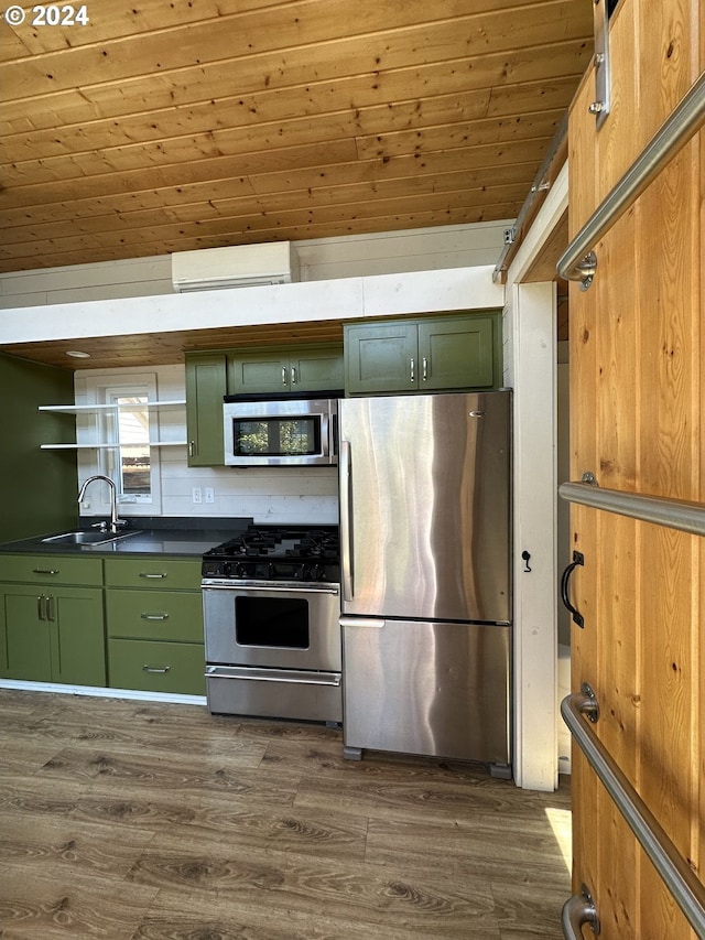 kitchen with green cabinets, dark wood-type flooring, wooden ceiling, and stainless steel appliances