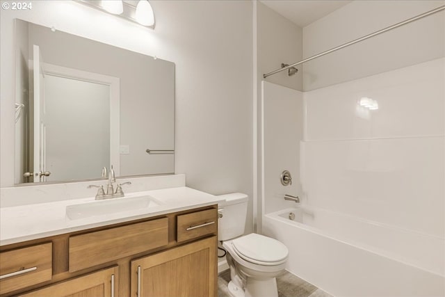 full bathroom with shower / washtub combination, vanity, and toilet