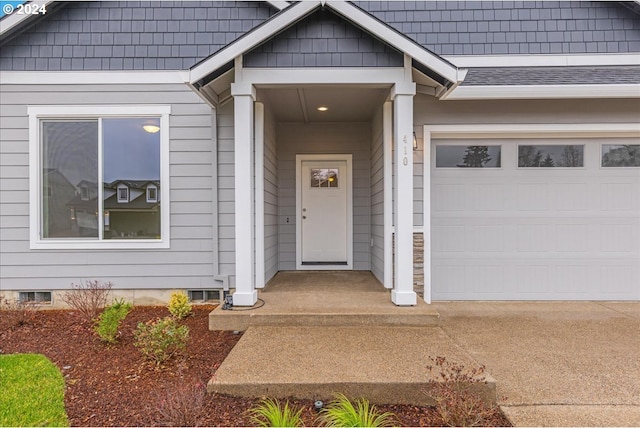 entrance to property with a garage