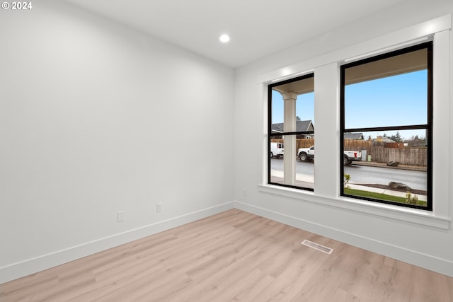 empty room with light wood-type flooring