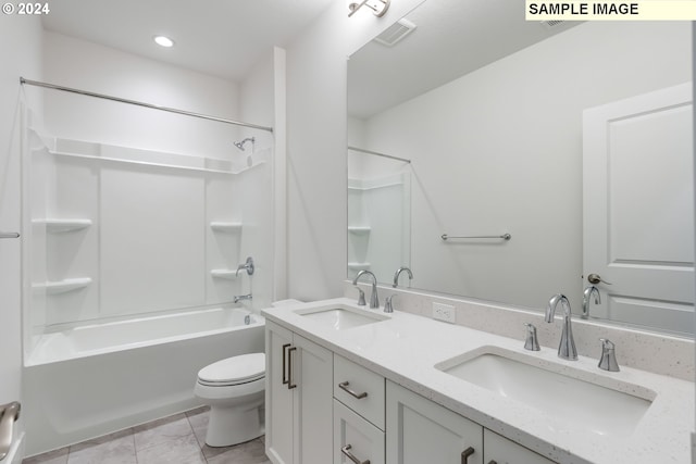 full bathroom with tile patterned floors, shower / bathtub combination, toilet, and vanity