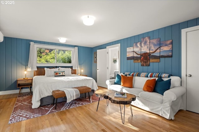 bedroom with wood finished floors