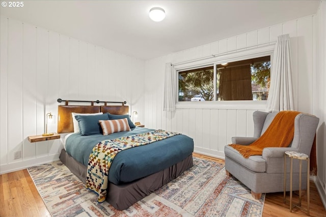 bedroom with wood finished floors