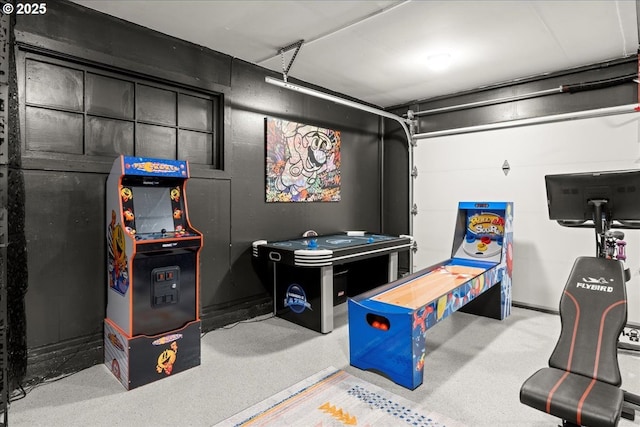 rec room with a garage