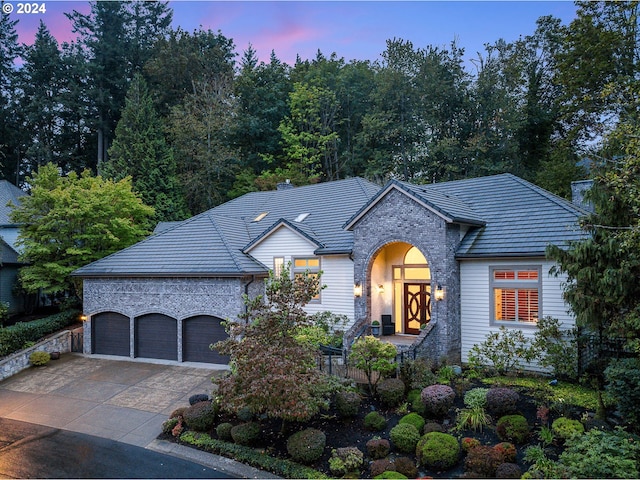 view of front of property with a garage