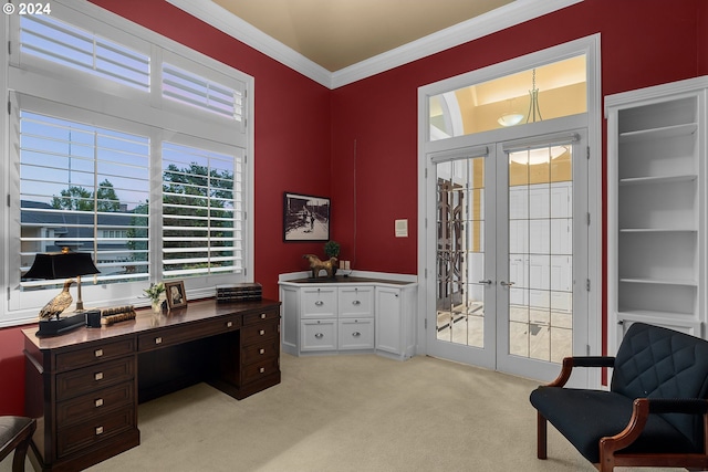 carpeted office space with french doors and crown molding