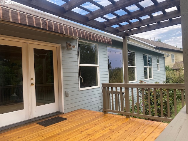 wooden deck featuring a pergola