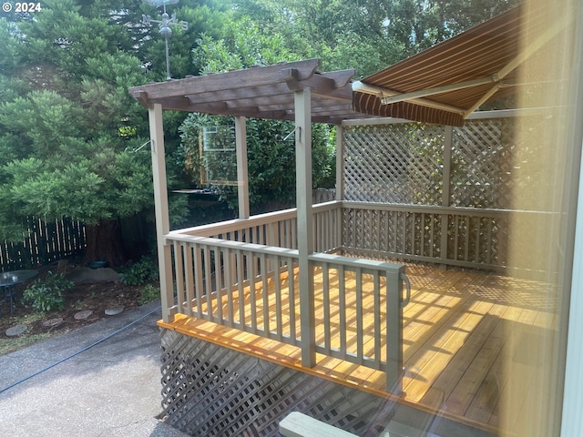 wooden deck with a pergola