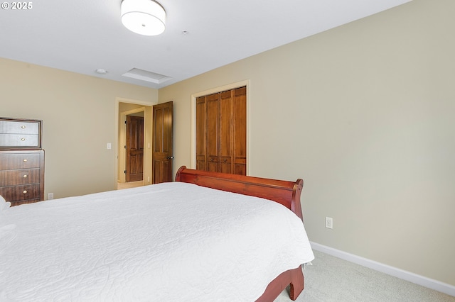 bedroom featuring a closet and carpet flooring