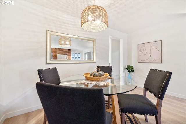 dining space featuring light hardwood / wood-style floors