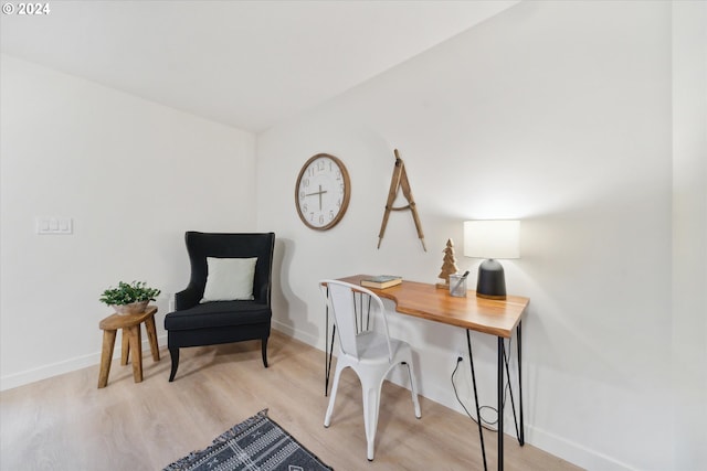 office space with light hardwood / wood-style floors