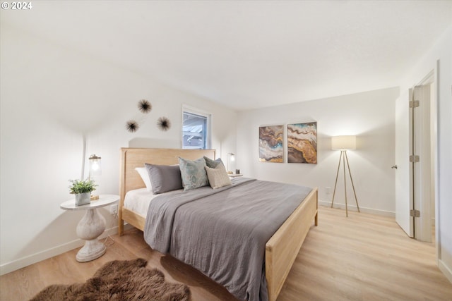 bedroom featuring light wood-type flooring