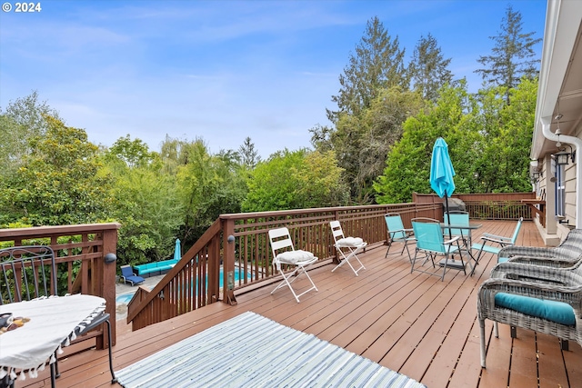 deck with outdoor dining space