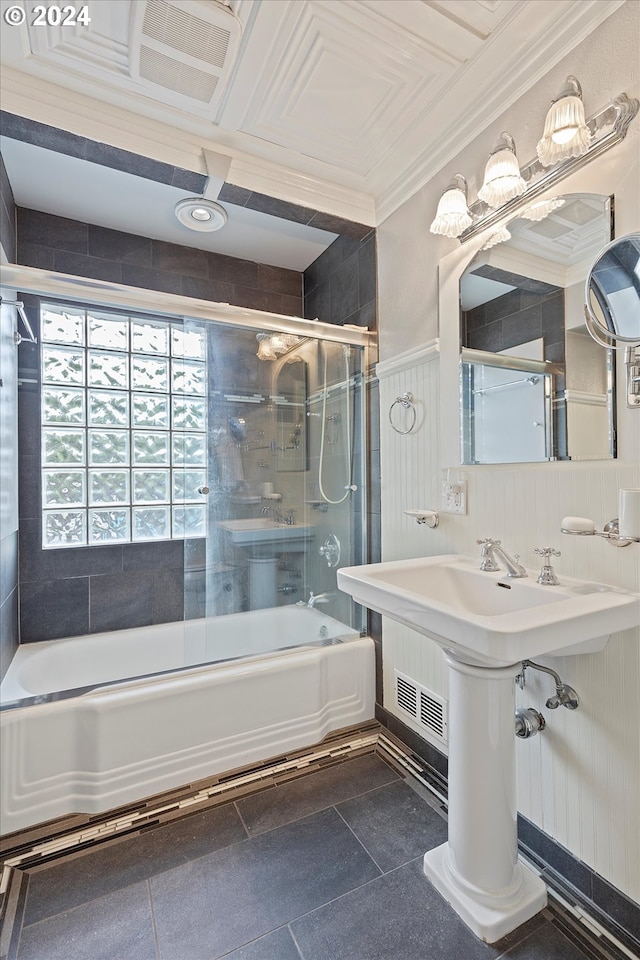 full bathroom with bath / shower combo with glass door and crown molding