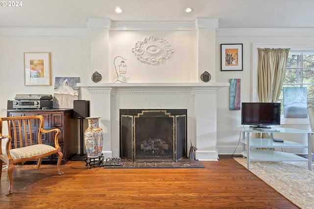 interior space with hardwood / wood-style floors and ornamental molding