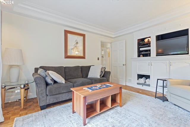 living area featuring baseboards and crown molding