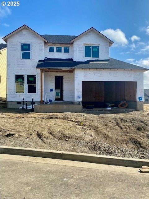 property under construction featuring a garage