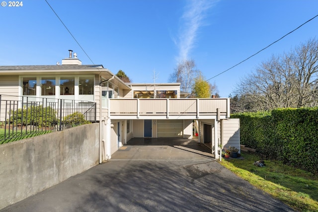 view of front of property featuring a garage