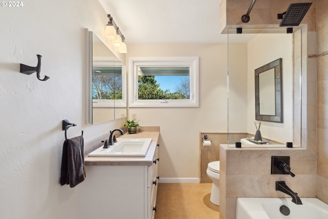 full bathroom featuring tile patterned flooring, shower / washtub combination, vanity, and toilet