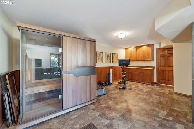 kitchen featuring wooden walls