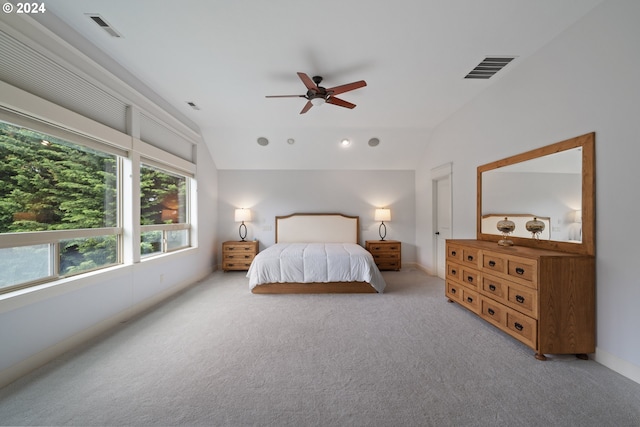 carpeted bedroom featuring ceiling fan and lofted ceiling