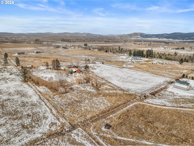 mountain view featuring a rural view