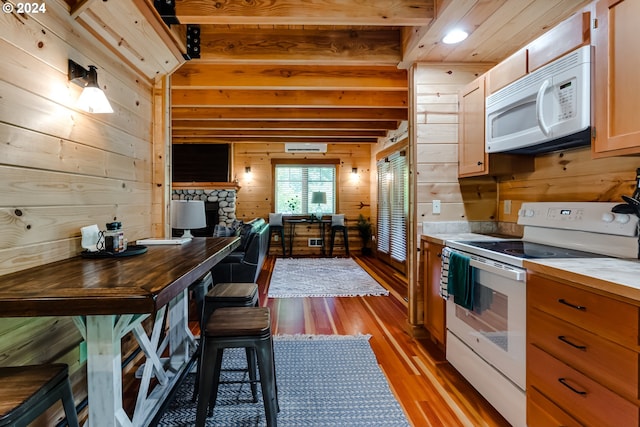 56483 Mckenzie Hwy Unit 20, Mckenzie Bridge, OR 97413 - kitchen featuring white appliances, wooden walls, light wood finished floors, butcher block countertops, and open floor plan