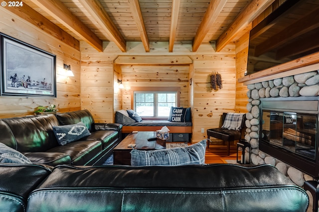 56483 Mckenzie Hwy Unit 20, Mckenzie Bridge, OR 97413 - living area featuring wood walls, wooden ceiling with exposed beams, and a fireplace