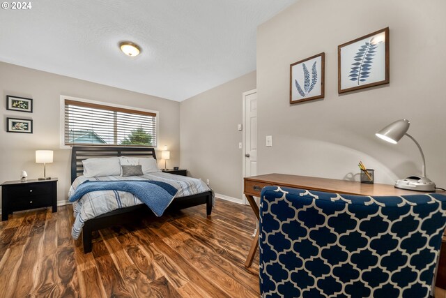 bedroom featuring hardwood / wood-style flooring