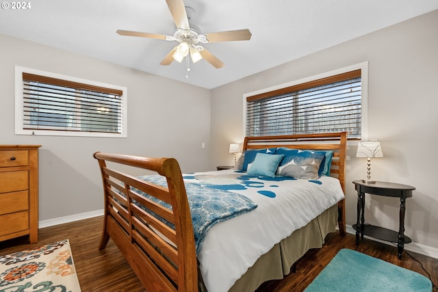 bedroom featuring dark hardwood / wood-style floors and ceiling fan