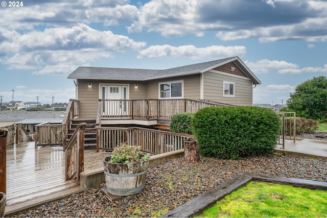 view of front of house featuring a wooden deck