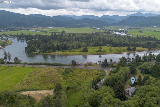 aerial view featuring a rural view and a water and mountain view