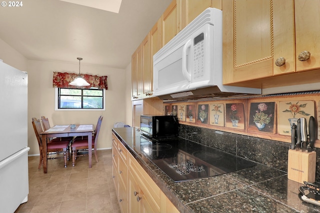 kitchen featuring pendant lighting, light brown cabinets, black appliances, light tile patterned floors, and tasteful backsplash